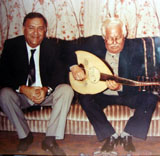 مع تلميذه علي الامام 2001